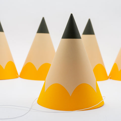 a traditional con-shaped party hat that looks just like a yellow school pencil