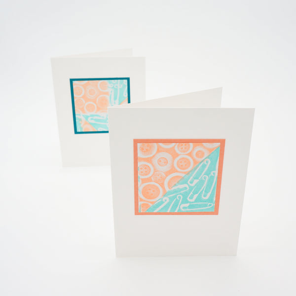 blank notecards - stamped buttons and safety pins in orange and teal