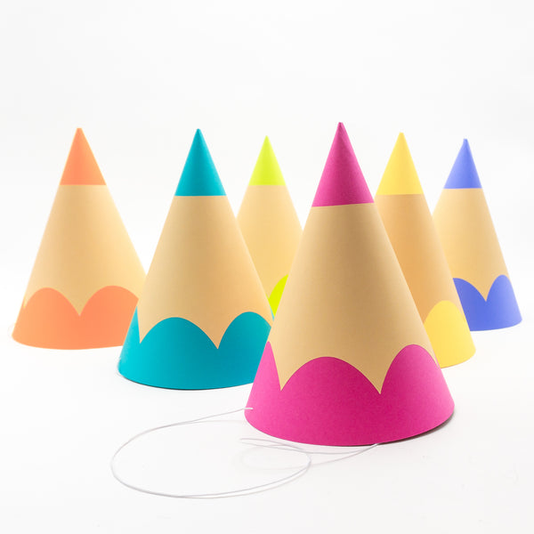 a traditional cone-shaped party hats that look just like colored pencils. The hat in the foreground is magenta.